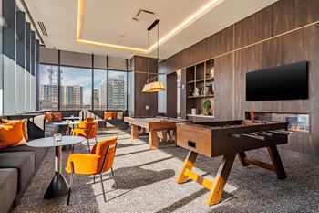 Community game room at 903 peachtree apartments in atlanta, ga 30309